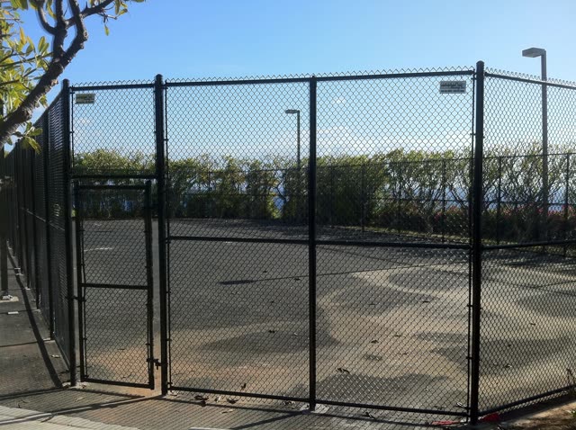 Vinyl and Vinyl Coated Chain Link fence installation by Bob's Fencing, photo 1 of 10
